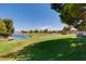 Scenic view of golf course surrounded by lush landscaping and trees at 4830 Grey Wolf Ln # 104, Las Vegas, NV 89149