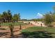 Expansive golf course view with lush green fairways and manicured landscaping under a clear blue sky at 4830 Grey Wolf Ln # 104, Las Vegas, NV 89149