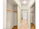 Hallway with closet space and tiled flooring leading to bathroom at 4830 Grey Wolf Ln # 104, Las Vegas, NV 89149