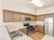 Well-equipped kitchen with stainless steel appliances and sleek countertops at 4830 Grey Wolf Ln # 104, Las Vegas, NV 89149