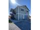 Two-story house exterior featuring unique blue accents at 4910 Elizabeth St, Pahrump, NV 89048