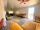 Open concept living room featuring wood floors, ceiling fan and natural light enhancing the spacious layout at 4910 Elizabeth St, Pahrump, NV 89048