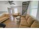 Spacious living room with tile flooring and modern seating arrangement at 4910 Elizabeth St, Pahrump, NV 89048