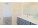 Bathroom vanity with modern fixtures, entering into the bedroom at 5400 E Grain Mill Rd, Pahrump, NV 89061