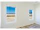 Bright bedroom offers lots of natural light and mountain views at 5400 E Grain Mill Rd, Pahrump, NV 89061