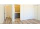 Bedroom view featuring a door to the ensuite bath and a sliding closet at 5400 E Grain Mill Rd, Pahrump, NV 89061