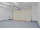 Clean and spacious two car garage with sealed concrete flooring at 5400 E Grain Mill Rd, Pahrump, NV 89061