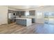 Spacious kitchen featuring a large island, sleek appliances and natural light at 5400 E Grain Mill Rd, Pahrump, NV 89061