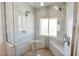 Glass shower with dual shower heads and built-in bench seating at 5400 E Grain Mill Rd, Pahrump, NV 89061