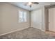 Bedroom features neutral walls, carpet flooring, a window, and a closet at 5429 Blinding Lights St, North Las Vegas, NV 89081