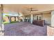 Beautiful covered patio featuring brick pavers, a hot tub, ceiling fans, a gazebo, and outdoor cooking area at 5429 Blinding Lights St, North Las Vegas, NV 89081