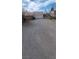 Wide driveway and garage behind desert home with plenty of space for parking at 5450 Humbolt Pl, Pahrump, NV 89060