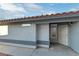 Side entrance with security door and decorative window for added curb appeal at 5553 Super Bowl Dr, Las Vegas, NV 89110