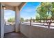 Private balcony in a condo overlooking a street and scenic neighborhood with mature trees at 5655 E Sahara Ave # 2009, Las Vegas, NV 89142