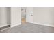 Neutral bedroom features plush gray carpet, white walls, and an inviting open doorway at 5655 E Sahara Ave # 2009, Las Vegas, NV 89142