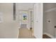 Hallway features hardwood-style flooring and white closet doors at 5655 E Sahara Ave # 2009, Las Vegas, NV 89142