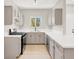 Modern kitchen with grey cabinets, stainless steel appliances, and white countertops at 5655 E Sahara Ave # 2009, Las Vegas, NV 89142