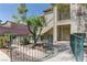 Charming condo with secure, gated entry, upstairs balcony, and cozy, low-maintenance landscaping at 5710 E Tropicana Ave # 1216, Las Vegas, NV 89122