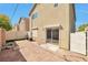 Spacious backyard featuring a concrete patio and access to the home through a sliding glass door at 5740 Winter Cherry St, Las Vegas, NV 89130