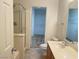 Bathroom showing a shower, toilet and sink vanity with access to the walk-in closet at 6255 W Arby Ave # 239, Las Vegas, NV 89118