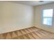 Bright bedroom featuring natural light from a window and patterned carpeting at 6255 W Arby Ave # 239, Las Vegas, NV 89118