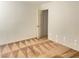 Bright bedroom featuring neutral walls, patterned carpeting and a doorway at 6255 W Arby Ave # 239, Las Vegas, NV 89118