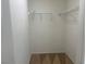 Walk-in closet featuring carpeted floors and white shelving at 6255 W Arby Ave # 239, Las Vegas, NV 89118