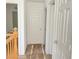 Hallway with carpeted floor leading to the bedrooms and bathroom at 6255 W Arby Ave # 239, Las Vegas, NV 89118