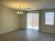 Bright living room with sliding glass doors leading to the outdoor space at 6255 W Arby Ave # 239, Las Vegas, NV 89118