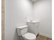 This half bath features a toilet and a floating sink with a white vanity, plus updated fixtures and hardware at 629 N 16Th St, Las Vegas, NV 89101