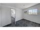Comfortable bedroom with an AC unit and a large window at 629 N 16Th St, Las Vegas, NV 89101