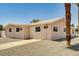 Cozy single-story home with a front door and a low maintenance gravel yard at 629 N 16Th St, Las Vegas, NV 89101
