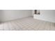 Spacious living room featuring neutral tile flooring and bright, natural light at 629 N 16Th St, Las Vegas, NV 89101