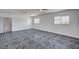 Bright living room featuring tile flooring, neutral walls and multiple windows at 629 N 16Th St, Las Vegas, NV 89101