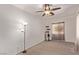 Cozy bedroom with a ceiling fan, a window with curtain, and cat tree at 6617 Johnny Love Ln, North Las Vegas, NV 89086