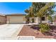 Inviting single-Gathering home with a neat front yard, complemented by desert landscaping and a cozy patio area at 6617 Johnny Love Ln, North Las Vegas, NV 89086