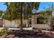 Attractive one-story house featuring a tiled roof and a landscaped front yard with mature trees at 6617 Johnny Love Ln, North Las Vegas, NV 89086