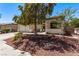 A well-maintained single-level residence boasting a desert landscape and a welcoming front porch at 6617 Johnny Love Ln, North Las Vegas, NV 89086