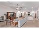 Open-concept living area with modern furnishings, fireplace, and seamless flow to the kitchen at 6617 Johnny Love Ln, North Las Vegas, NV 89086