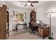 Well lit office space with desk, storage, and a ceiling fan at 6617 Johnny Love Ln, North Las Vegas, NV 89086