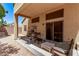 Covered patio with seating area, perfect for outdoor relaxation at 6617 Johnny Love Ln, North Las Vegas, NV 89086