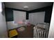 Cozy bedroom with a crib and window with natural light at 6812 Sheffield Dr, Las Vegas, NV 89108