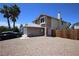 Charming two-story home featuring a spacious driveway, desert landscaping, and a well-maintained exterior at 6812 Sheffield Dr, Las Vegas, NV 89108