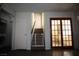 Carpeted staircase with safety gate at 6812 Sheffield Dr, Las Vegas, NV 89108