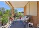 Cozy balcony with seating and colorful pillows offers a relaxing outdoor space at 7301 Heggie Ave, Las Vegas, NV 89131