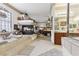 A large bathroom showcases a tub next to a fireplace and opens to the main bedroom at 7301 Heggie Ave, Las Vegas, NV 89131