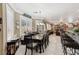 Open-concept dining area with bright light and bar-style seating at 7301 Heggie Ave, Las Vegas, NV 89131