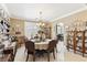 Well-appointed dining room featuring a round table, decorative lighting, and decorative dishware at 7301 Heggie Ave, Las Vegas, NV 89131