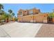Beautiful shot of a two-story home with a three-car garage at 7301 Heggie Ave, Las Vegas, NV 89131