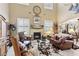 Charming living room with fireplace and high ceilings at 7301 Heggie Ave, Las Vegas, NV 89131